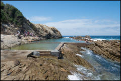 Bermagui's famous Blue Pool is a natural rock pool at the base of a dramatic rocky cliff face. It is a favourite swimming spot.