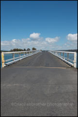 The historic wooden Wallaga Lake bridge was built to give farmers access to Bermagui wharf enabling them to ship their produce to Sydney.