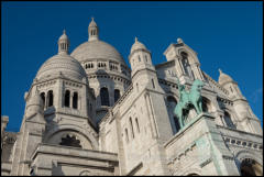 The Basilica of the Sacred Heart of Paris, commonly known as Sacre-Cœur Basilica, is located at the summit of the Montmartre, the highest point in the city.