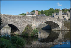 The ancient stone bridge, called le vieux pont, over the River Rance in the Port of Dinan, Brittany, France.