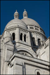 The Basilica of the Sacred Heart of Paris, commonly known as Sacre-Cœur Basilica, is located at the summit of the Montmartre, the highest point in the city.