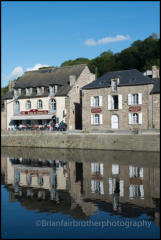 The Port of Dinan on the Rance in Brittany, France. The Harbour was a major trading port from the 11th century but is now used for pleasure boating.