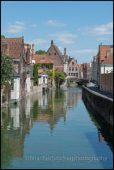 View along the Speelmansrei und Augustijnenrei canal from Gouden-Handrei. Bruges, Belgium.