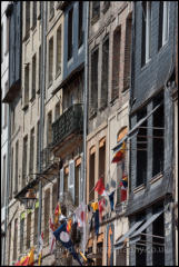 Quayside historic buildings around the Vieux-Bassin (Old Harbour) in the medieval town of Honfleur, France.