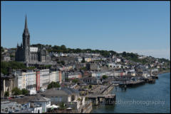 Cobh town and waterfront, County Cork, Ireland. St Colman's Cathedral is overlooking the town and Cork Harbour.