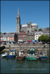 Cobh town and waterfront, County Cork, Ireland. St Colman's Cathedral is overlooking the town and harbour.