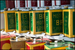 A display of vintage fuel cans at the Great Dorset Steam Fair, Dorset.