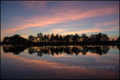 Sunset at Hatchet Pond near Beaulieu in the New Forest, Hampshire, England.